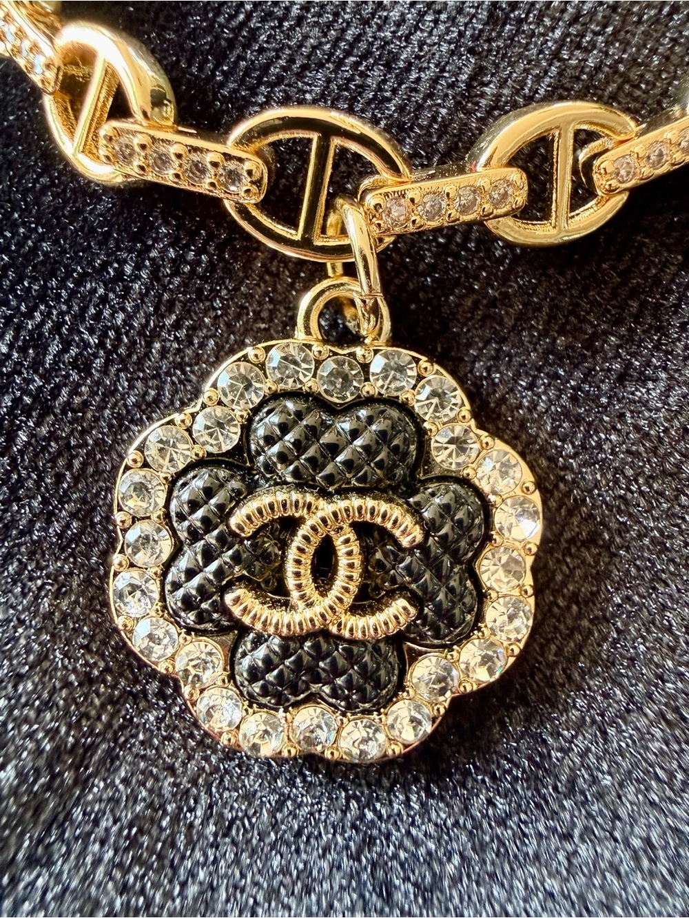 Gold-Tone Pig ๐ฝ Nose Link Bracelet with Black CHANEL Camellia Charm - Picture 2 of 9